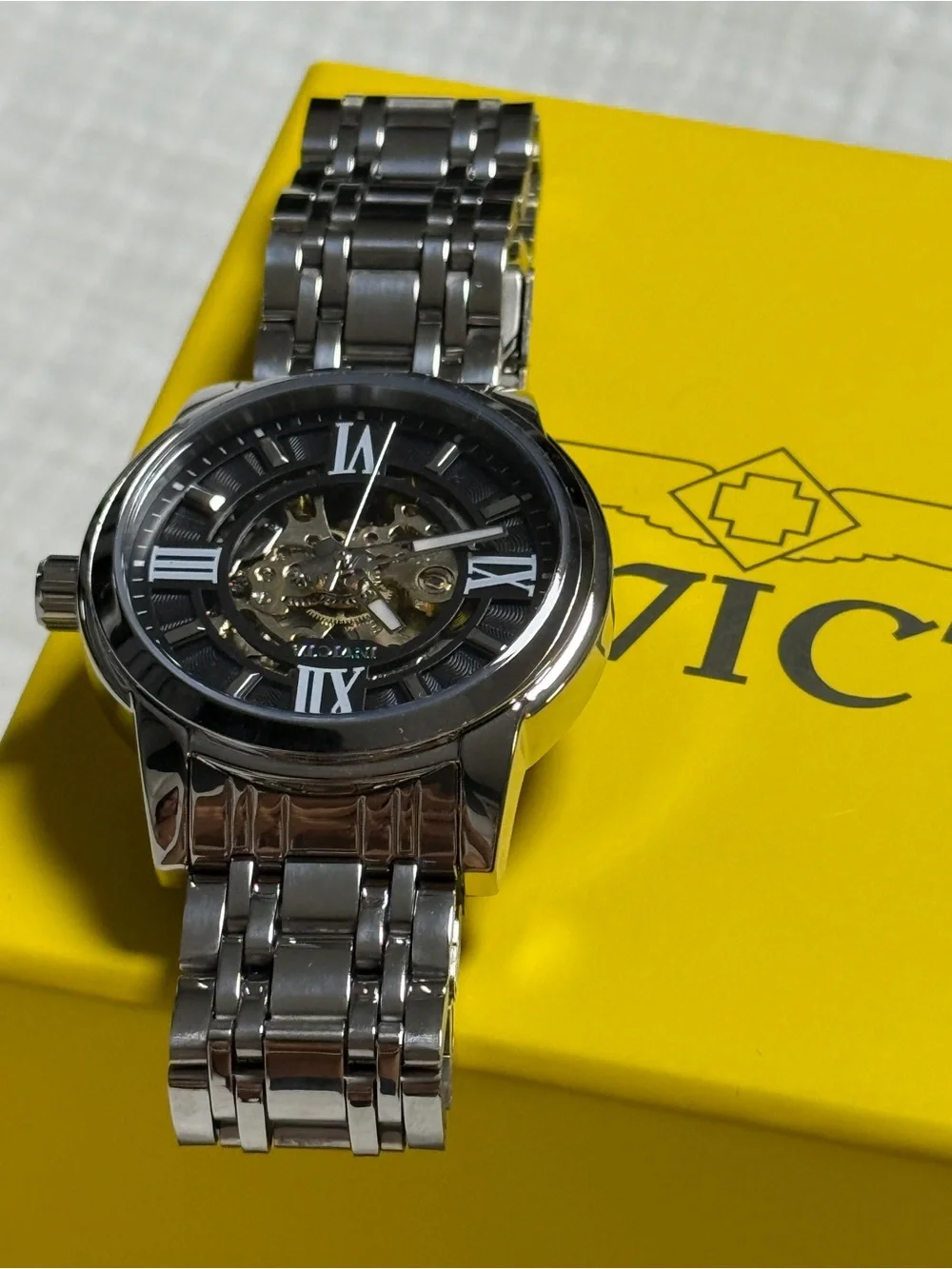 Invicta Silver Stainless Steel Men's Watch with Black Skeleton Dial